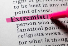 Highlighted definition of the word 'extremist' in a dictionary