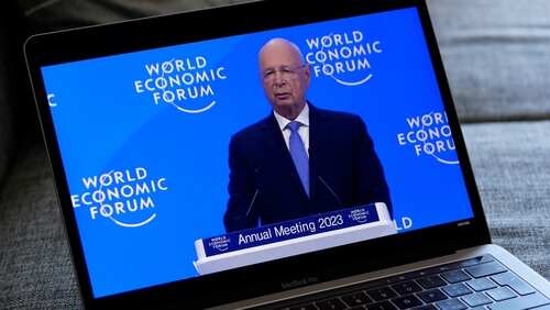 Keynote speaker presenting at the World Economic Forum Annual Meeting 2023 on a laptop screen