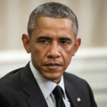 Obama vs. Pelosi: Explosive Democrat Rift A serious-looking man in formal attire sitting in a meeting