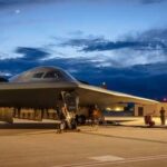 B-2 Spirit stealth bomber being serviced at night