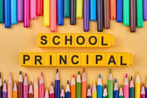 Colorful stationery arranged around the words 'SCHOOL PRINCIPAL'