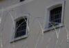 Barbed wire in front of prison windows
