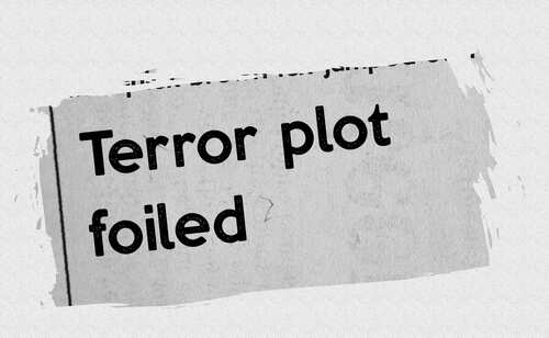 Newspaper headline stating 'Terror plot foiled'
