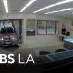Robbery suspects crash SUV through Anaheim jewelry store's