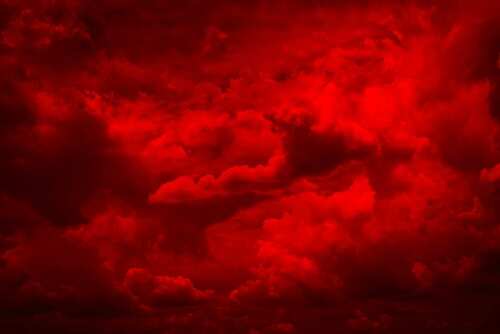 A dramatic sky filled with red clouds