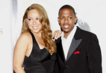 Mariah Carey and Nick Cannon posing together at a red carpet event