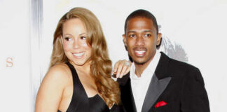 Mariah Carey and Nick Cannon posing together at a red carpet event