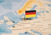Germany’s Chilling Warning: Russia 2029 A small German flag placed on a map of Europe highlighting Germany