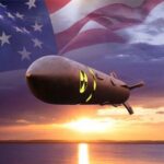 A nuclear missile with an American flag backdrop during sunset