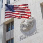 Operation Midnight Hammer Stuns Iran! American flag waving in front of a United States court house