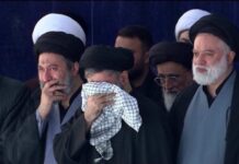 Khamenei sons mourn at father's funeral in Tehran | AFP