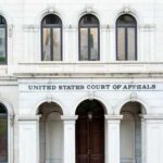 Viral Kiss Upends Elite Law Firm Facade of the United States Court of Appeals with arched windows