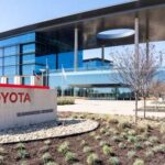 Texas Surge Rattles California Exterior view of Toyota headquarters building with a prominent sign