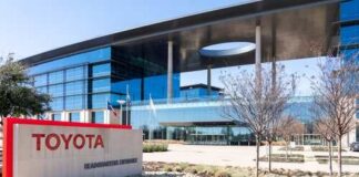 Exterior view of Toyota headquarters building with a prominent sign